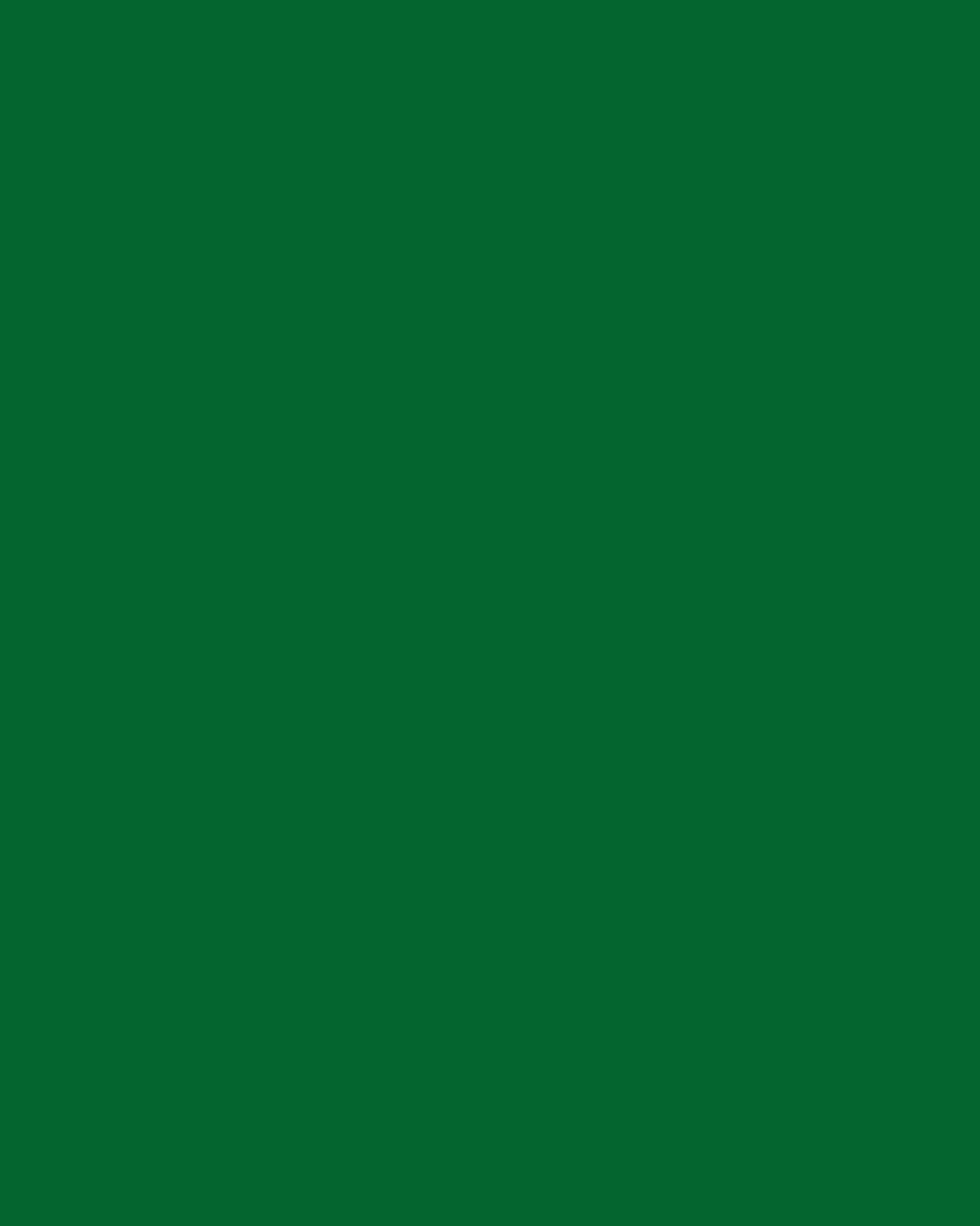 A solid dark green background.